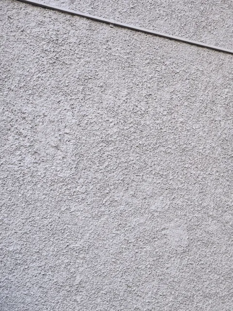 Détail de la texture d’un crépi extérieur.