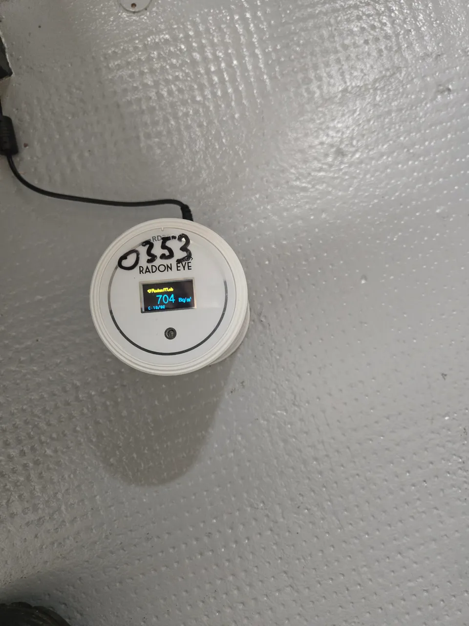 Electronic radon measuring device placed in a building.